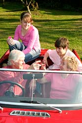 grandparents and kids in car